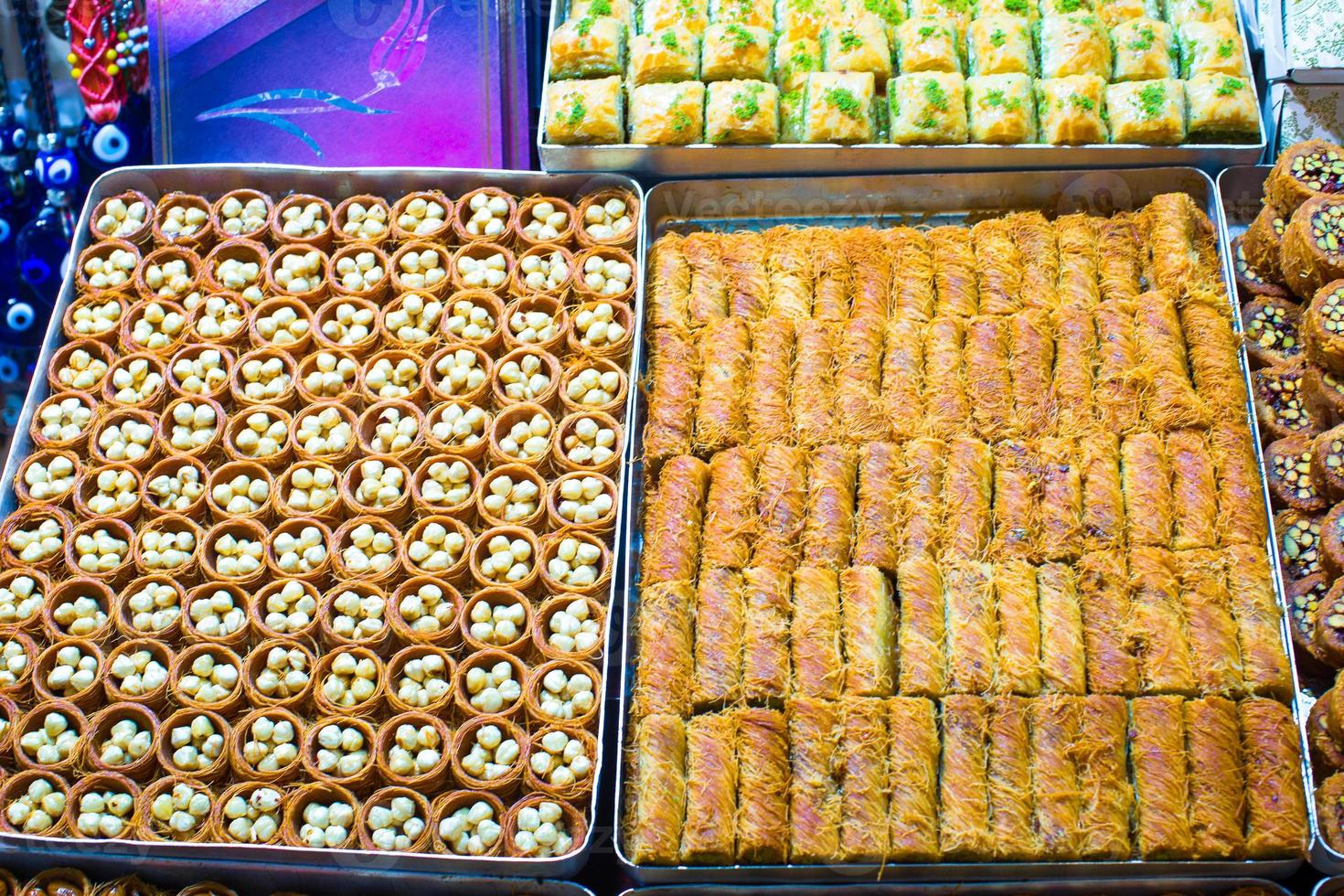 Traditional tasty Turkish sweets on the market photo