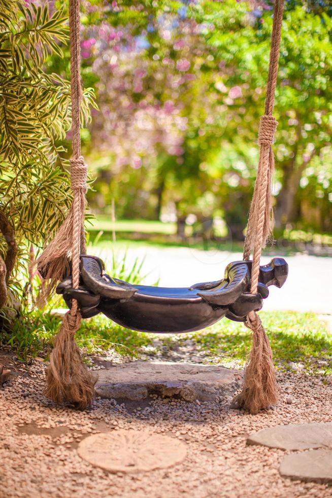 Close-up of a beautiful swing in the garden photo