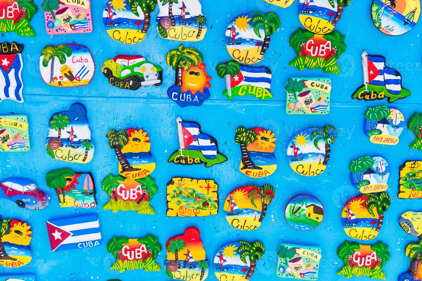 Magnetic board with souvenir magnets of Havana and Cayo Largo island at local market. photo