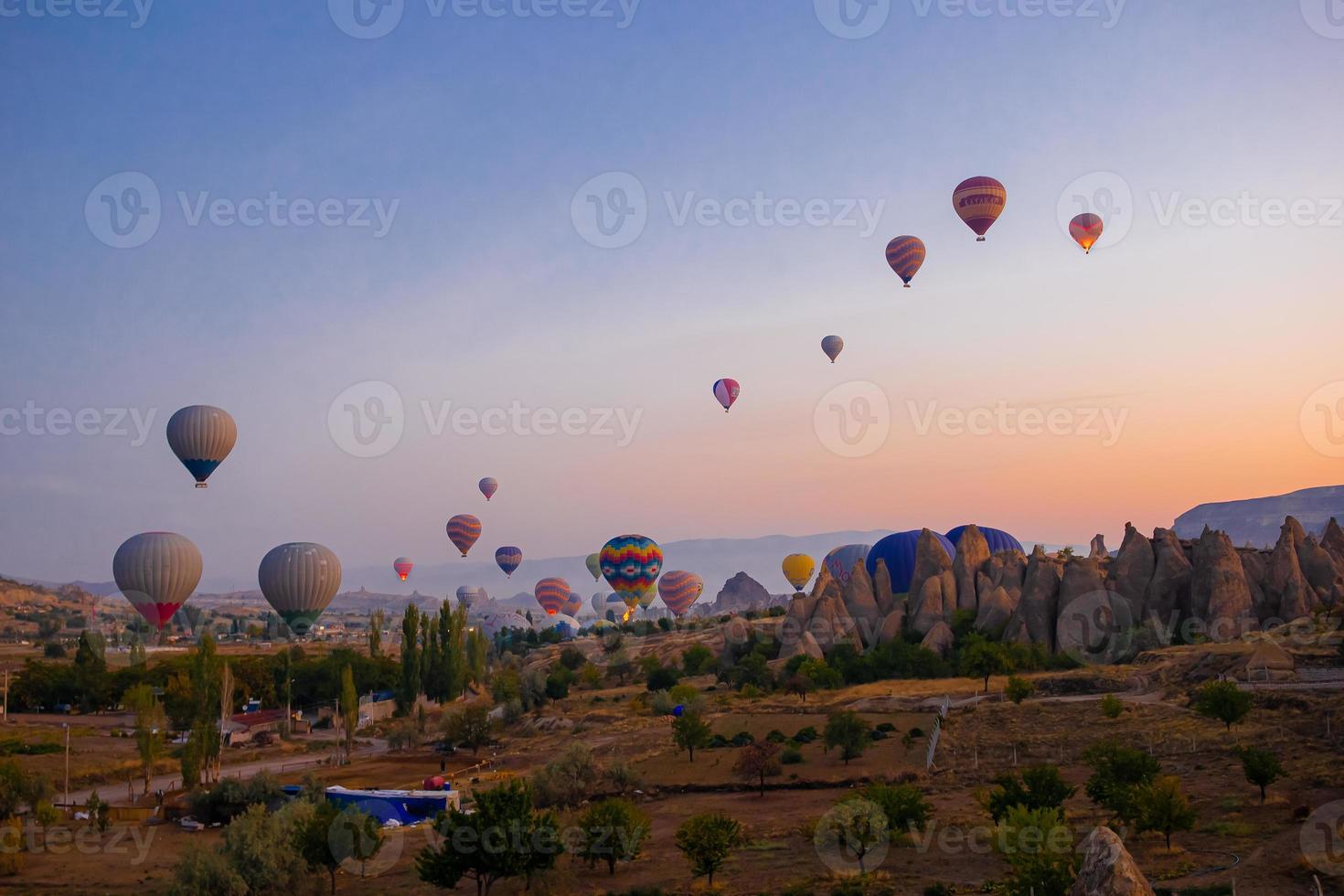 Bright hot air balloons in sky of Cappadocia, Turkey photo