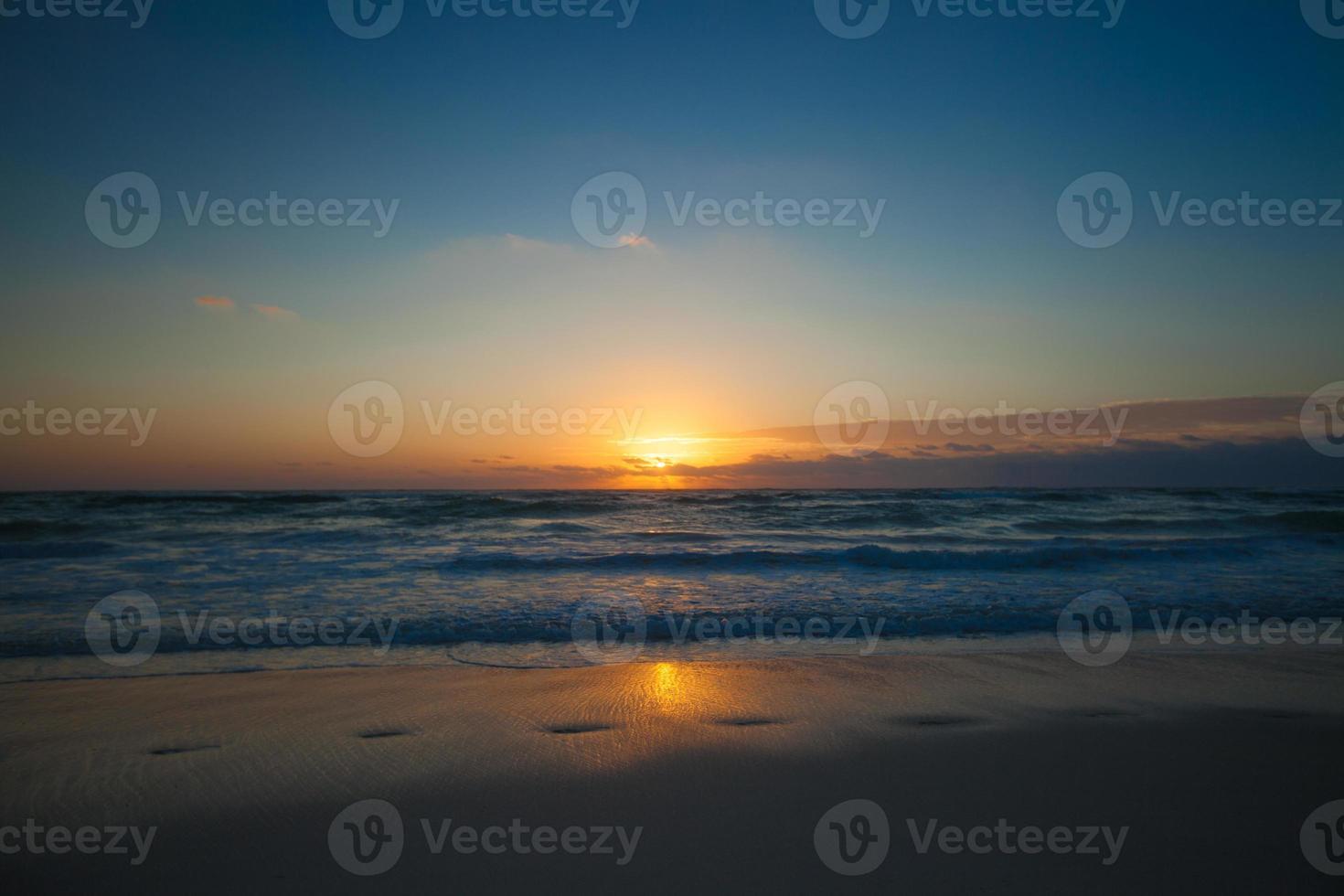 Amazing colorful sunset on the beach resort in Mexico photo