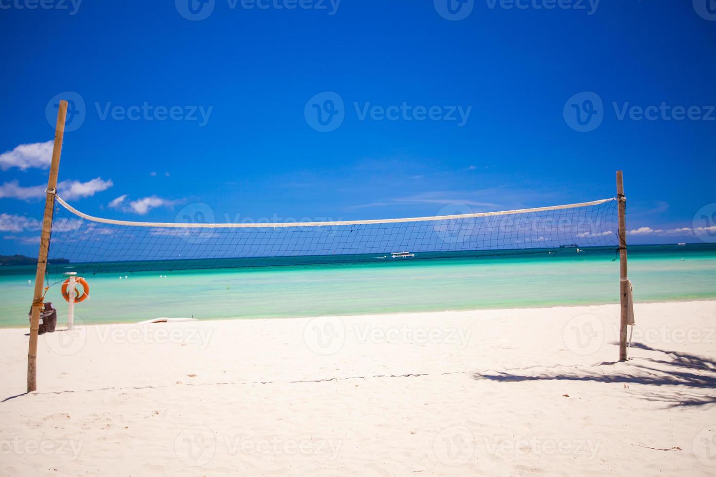 Basketball net on the tropical beach photo