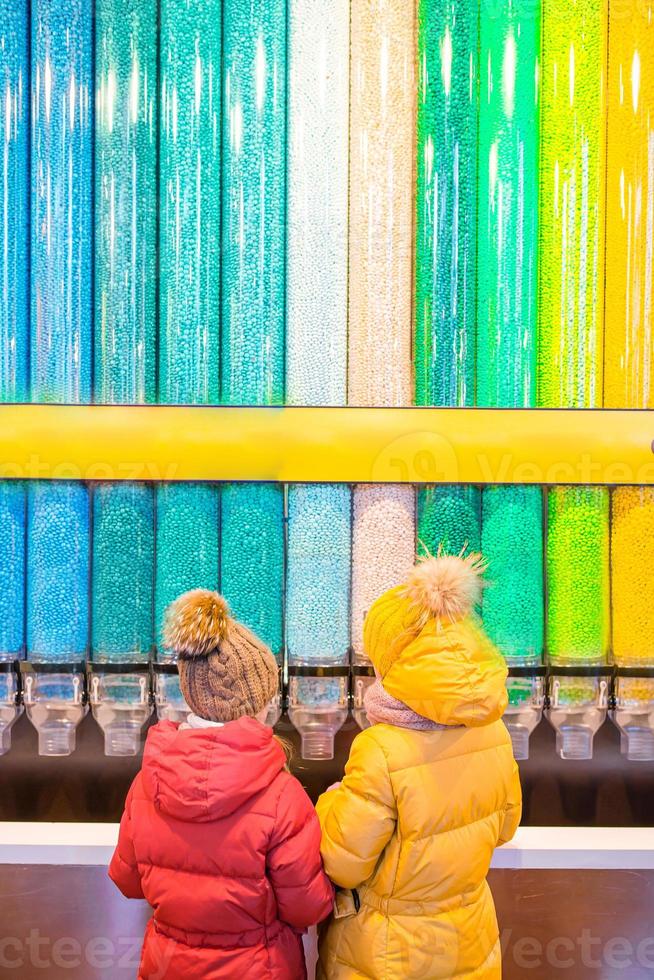 Famous M M Candies at candy dispenser machines in the Times Square shop in New York photo