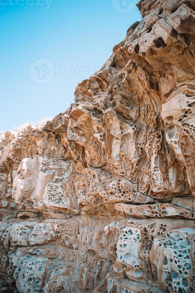 Cheese rocks from quartzite sandstone on Balck Sea in Crimea. photo