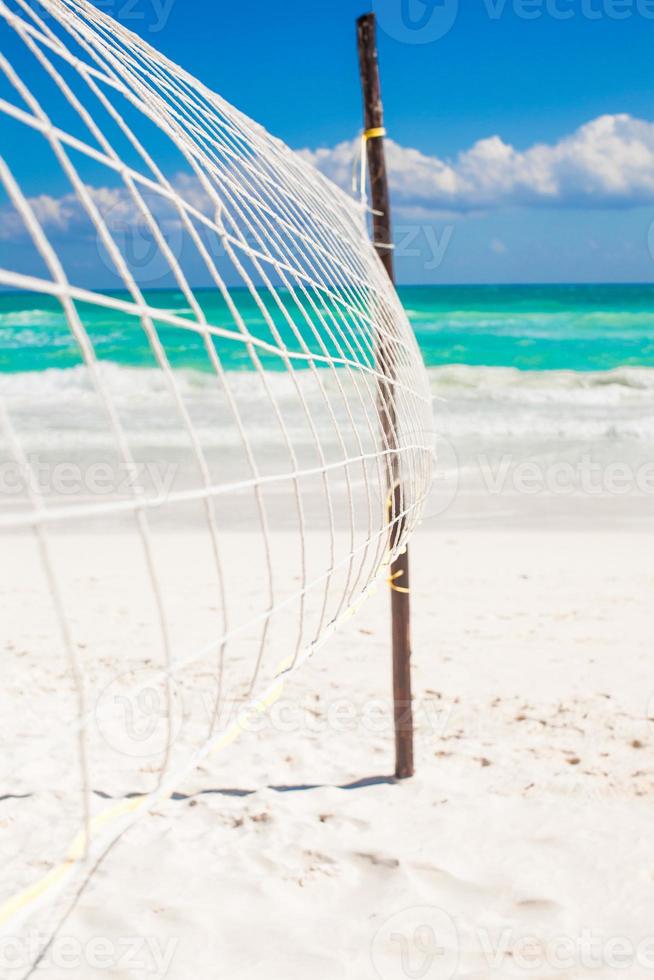 Closeup basketball net at the empty tropical exotic beach photo