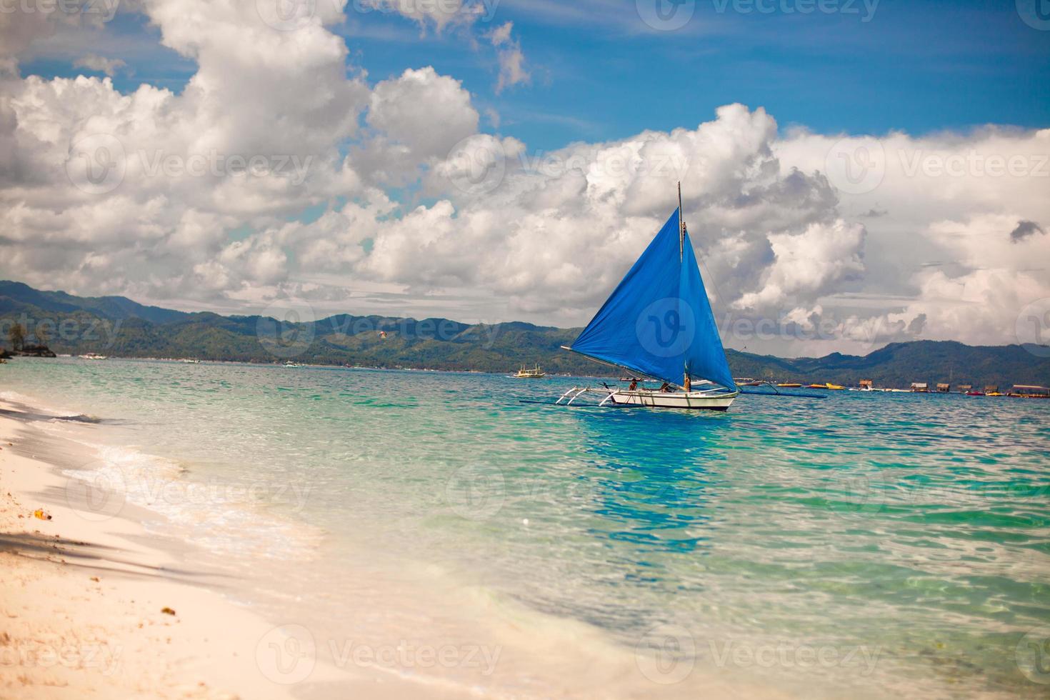 Blue Boats on Boracay island in the sea, Philippines photo