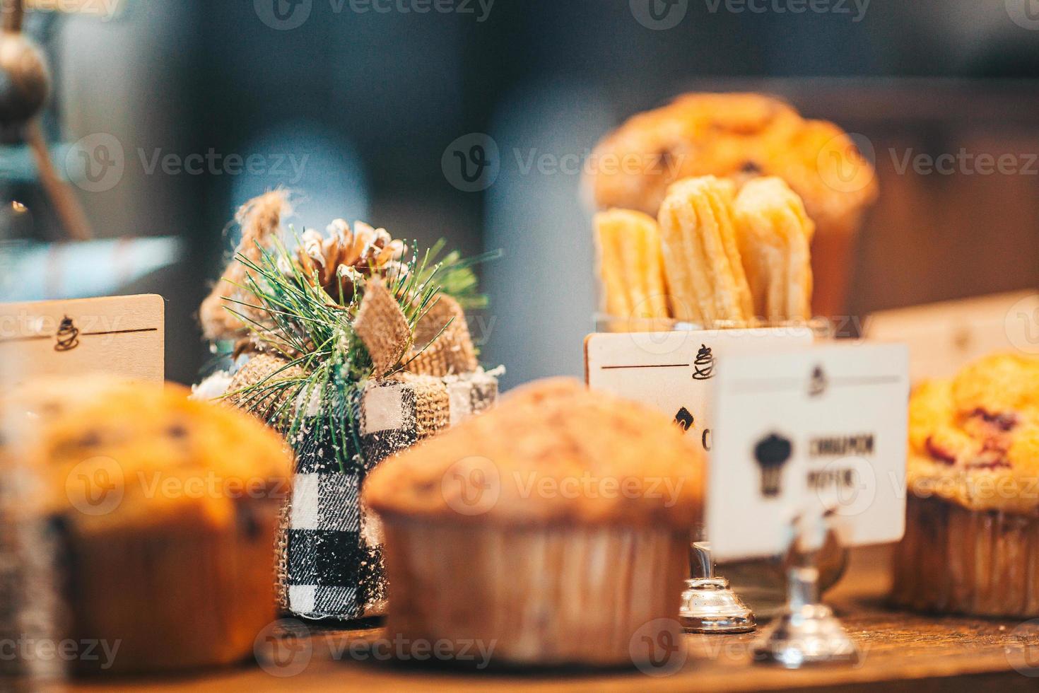 Delicious fresh pastries on showcase in a cafe photo