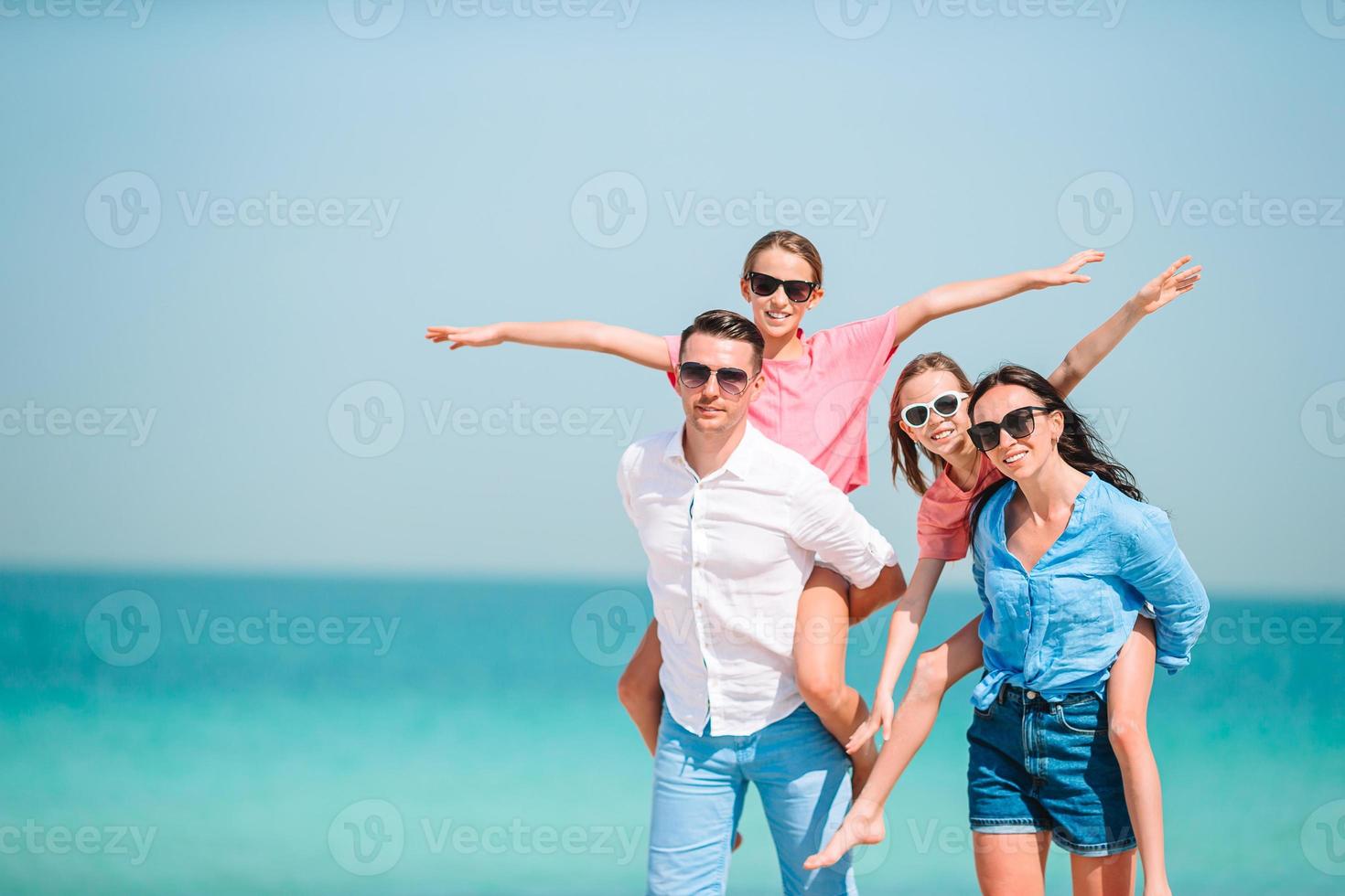 Young family on vacation have a lot of fun photo