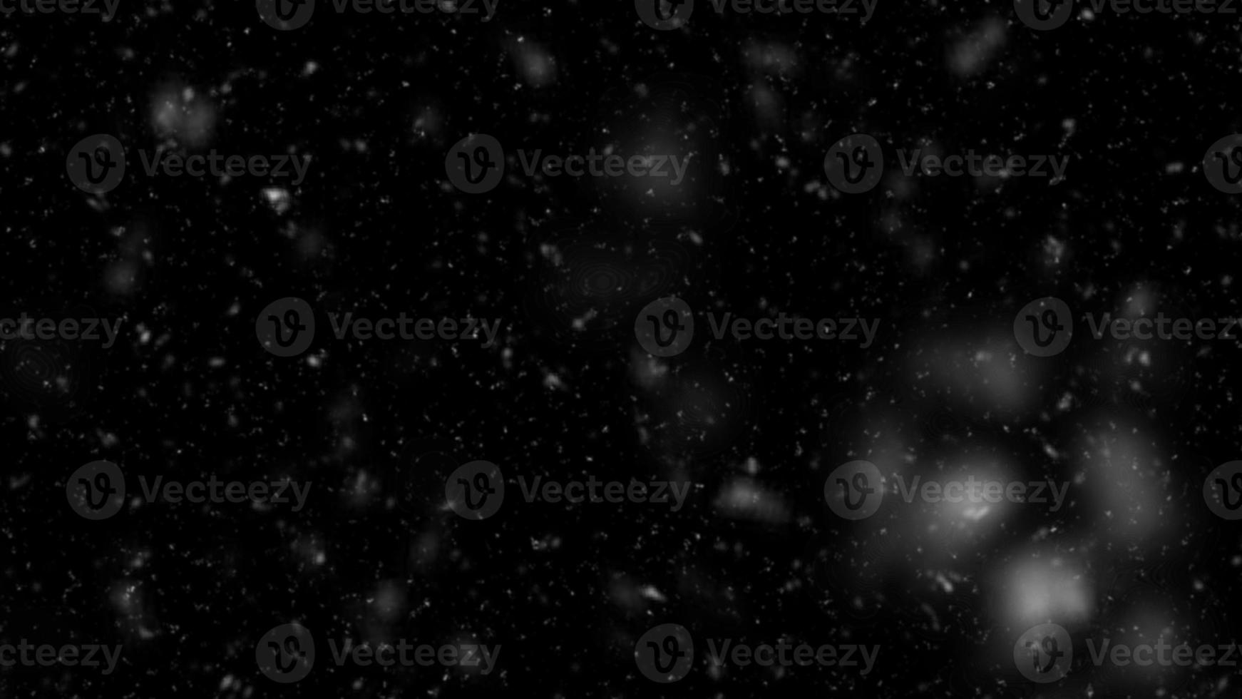 Falling snow isolated on black background. Falling snow at night. Bokeh lights on black background, flying snowflakes in the air. Winter weather. Overlay texture photo