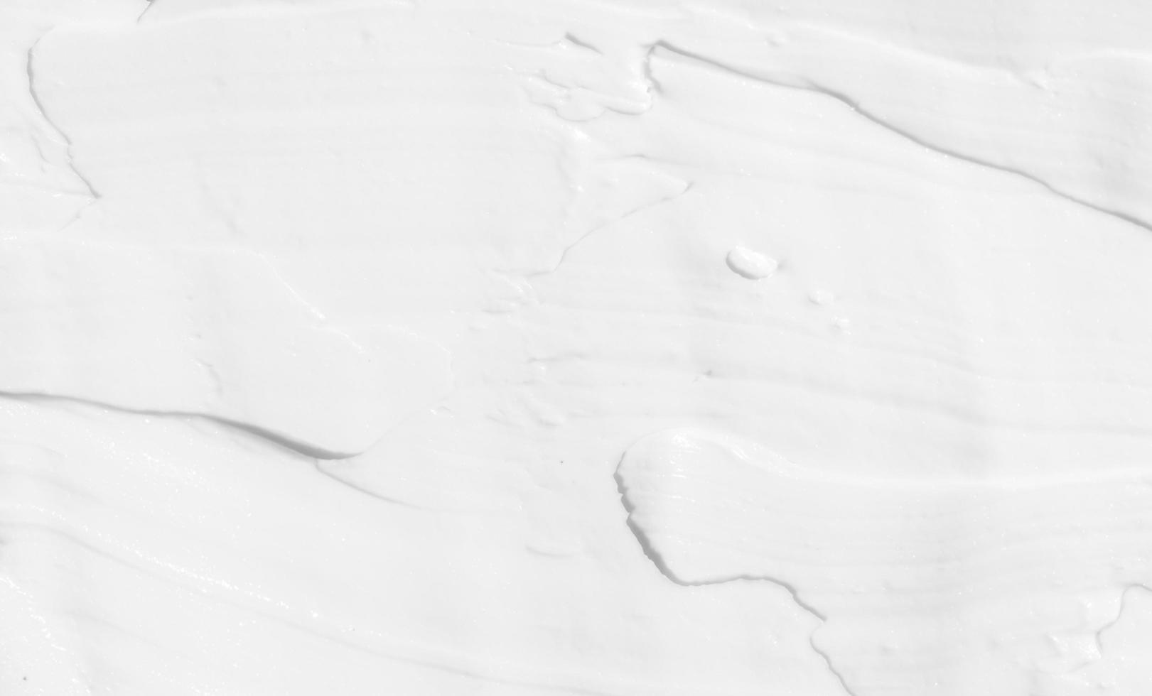 White cream background texture. Cosmetic product skin care. Full frame photo