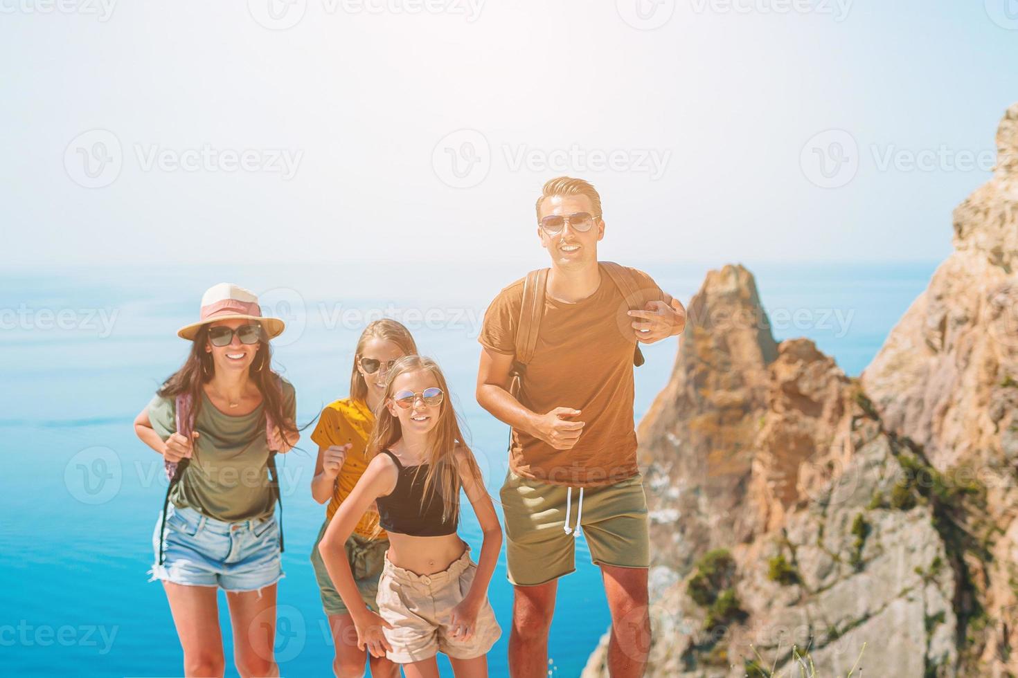 Happy family on vacation in the mountains photo