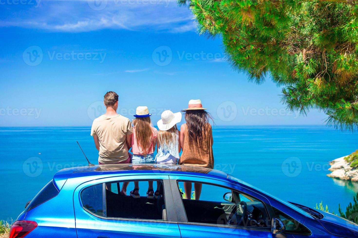 Summer car trip and young family on vacation photo