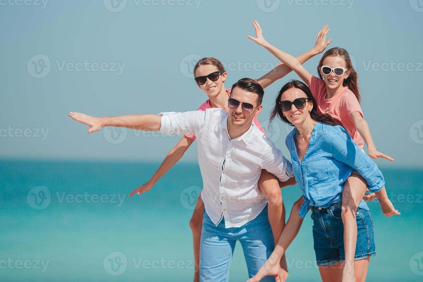 Young family on vacation have a lot of fun photo