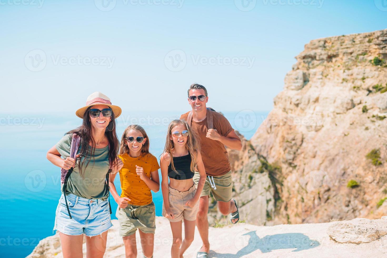Happy family on vacation in the mountains photo