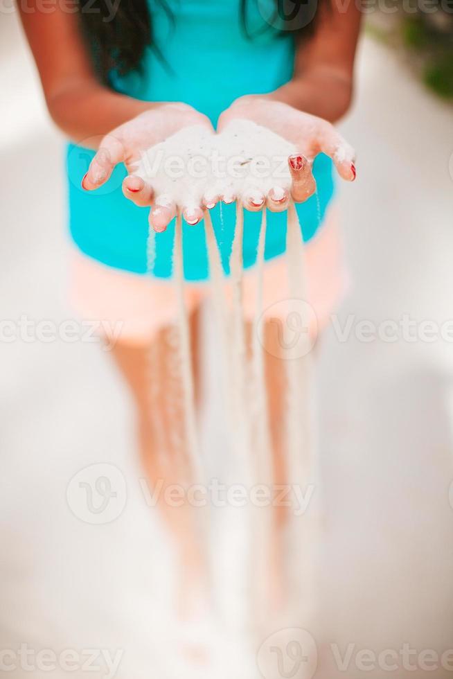 Woman on the beach enjoying summer holidays photo