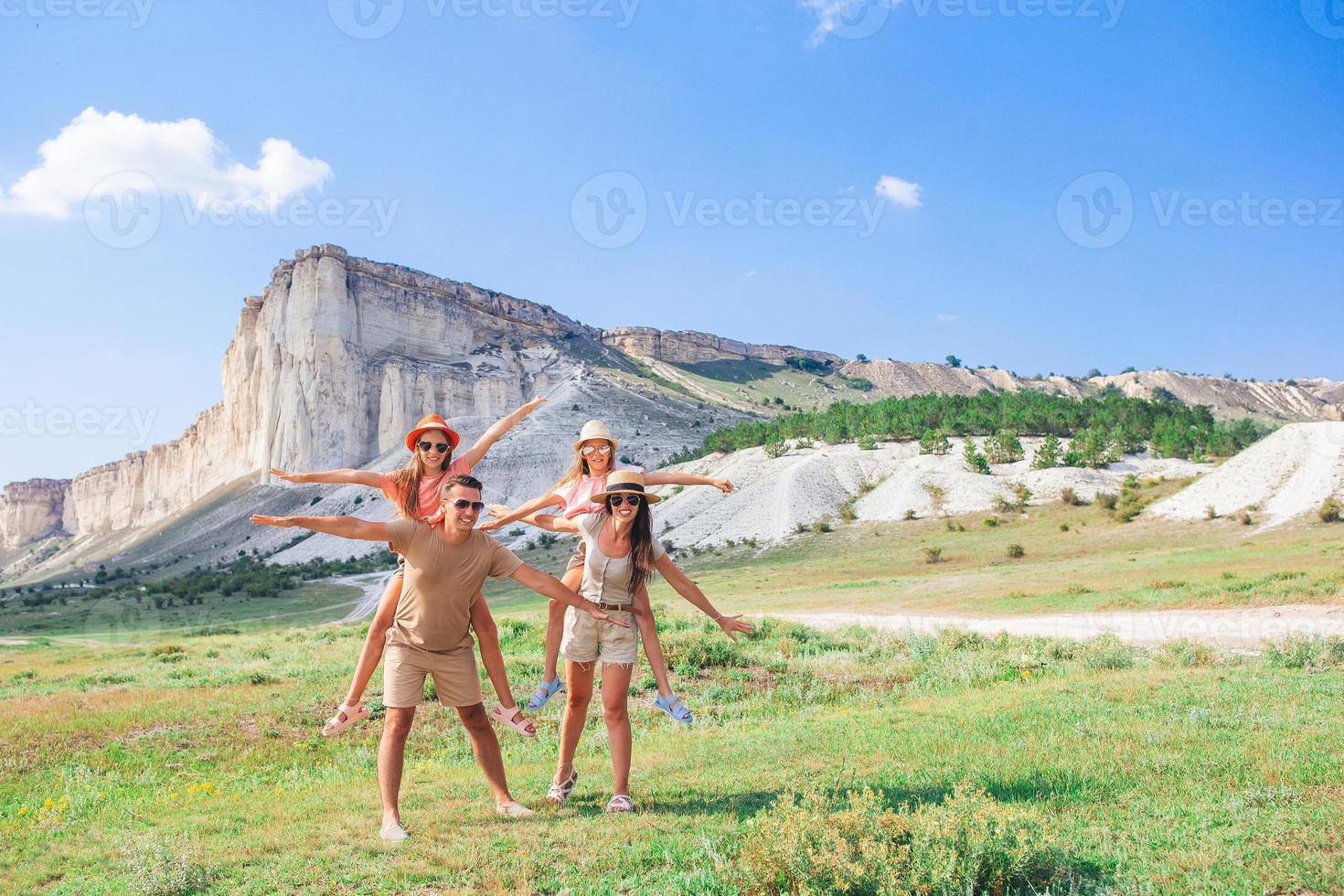 Happy family on vacation in the mountains photo