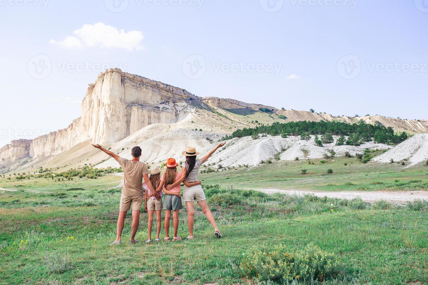 Happy family on vacation in the mountains photo