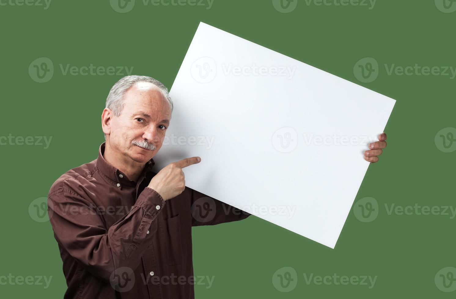 Senior man holds a blank board photo