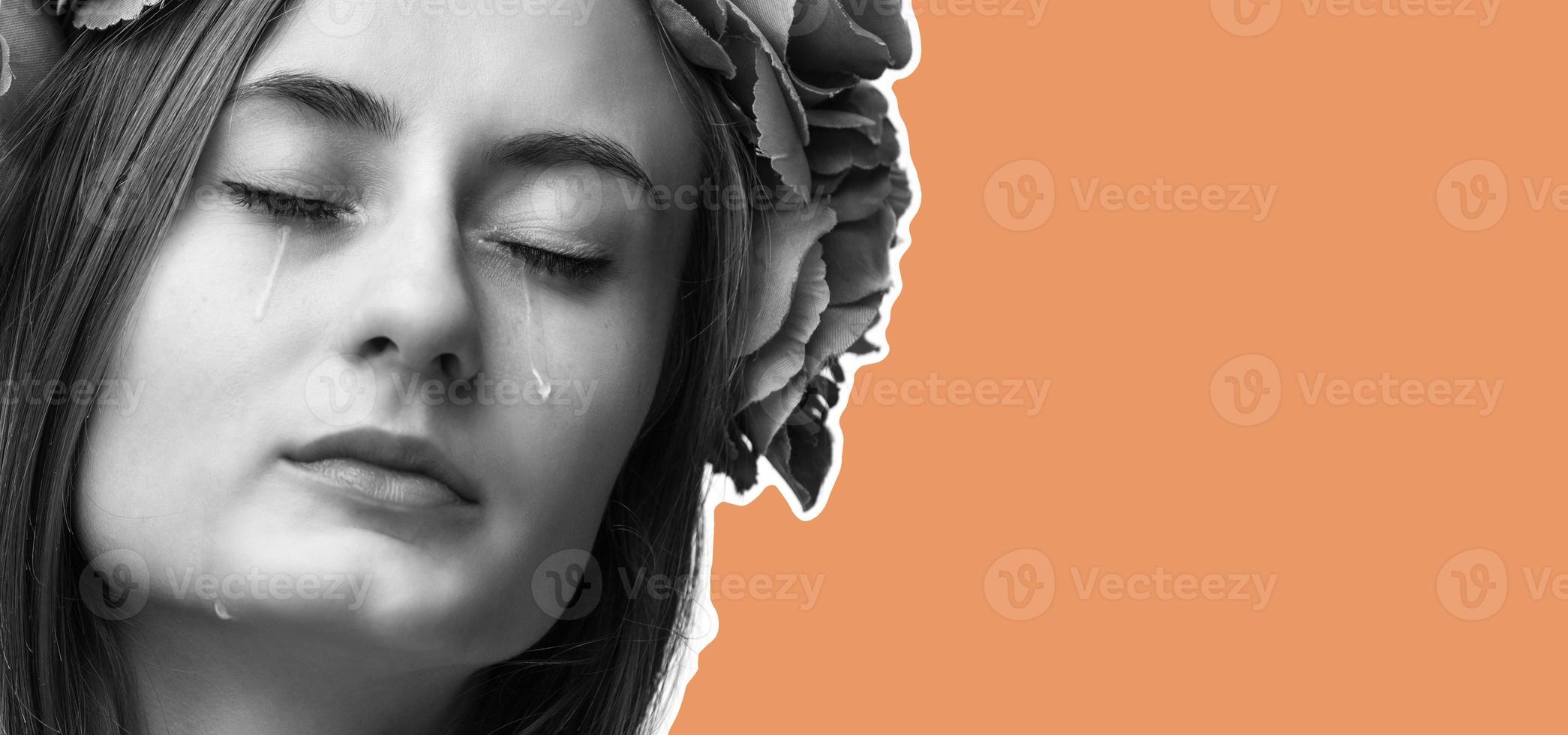 Portrait of young beautiful woman crying photo