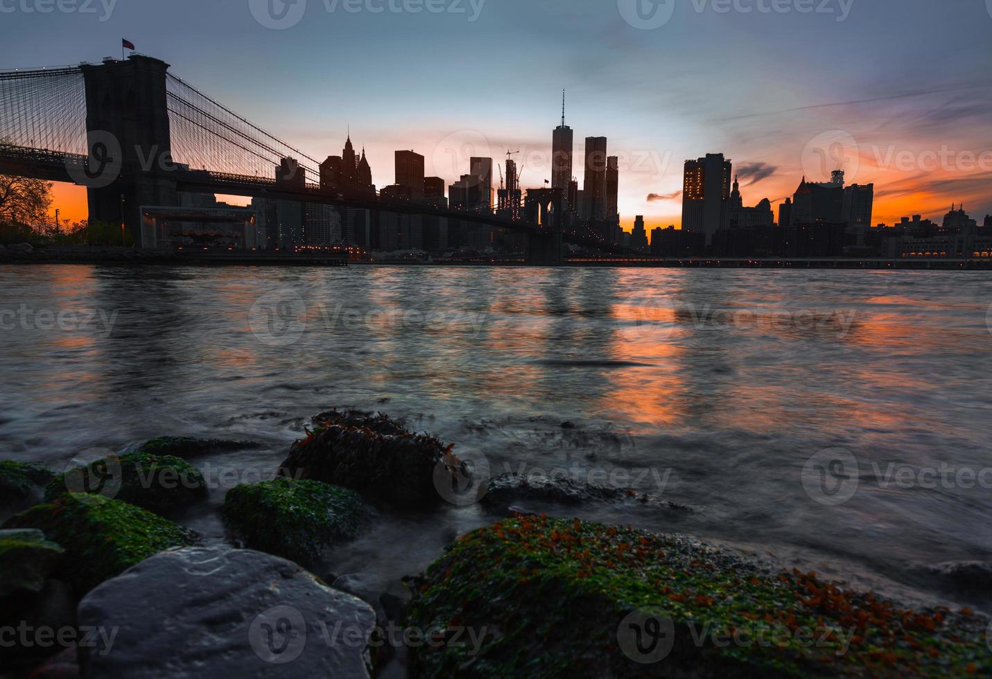 Manhattan skyline with Brooklyn Bridge photo