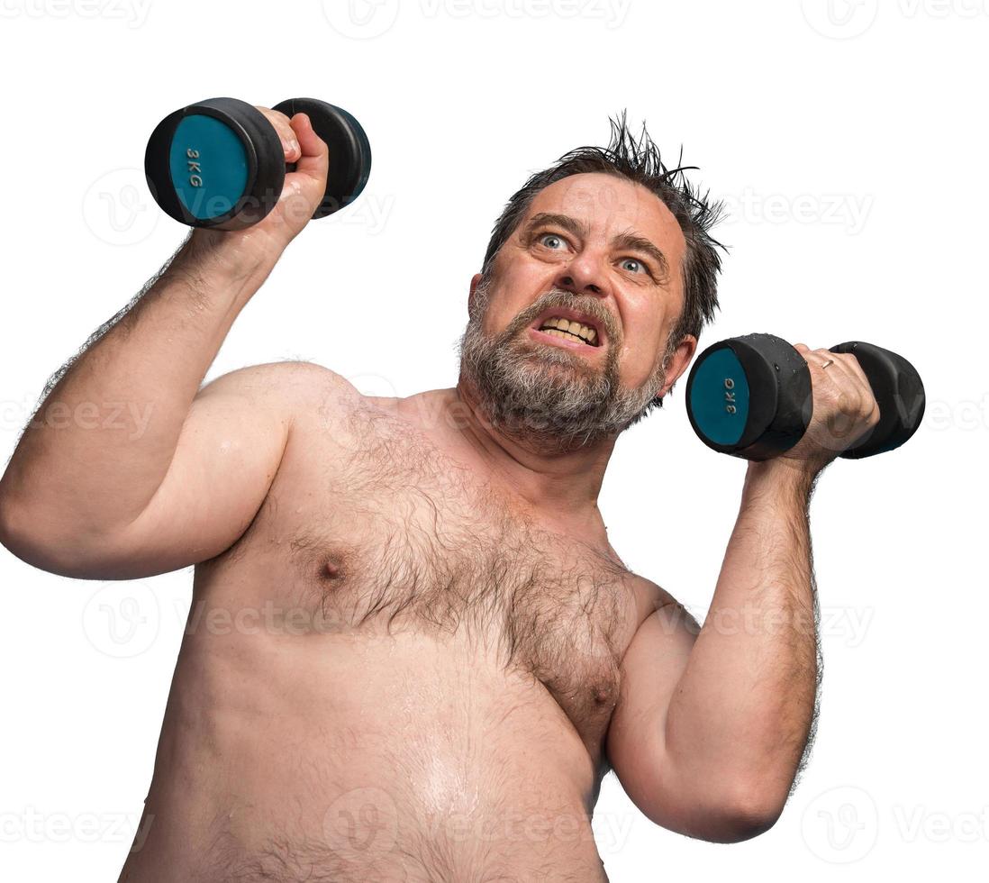 man exercising with dumbbells photo