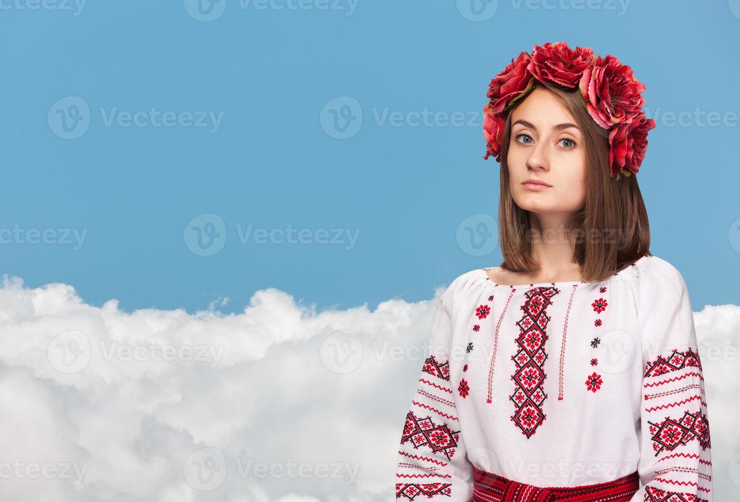 sad girl in the Ukrainian national suit photo