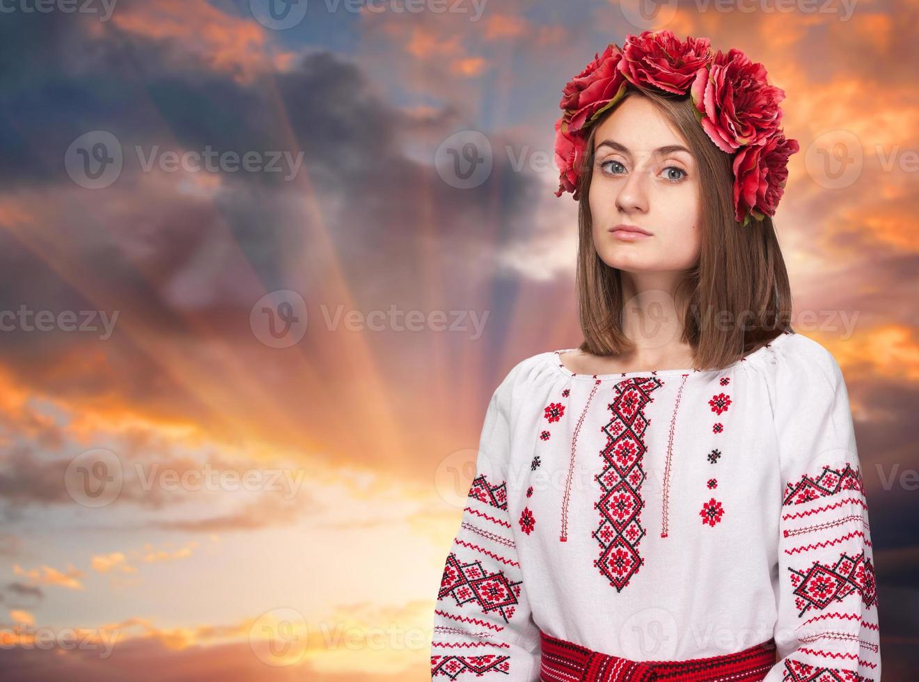 sad girl in the Ukrainian national suit photo