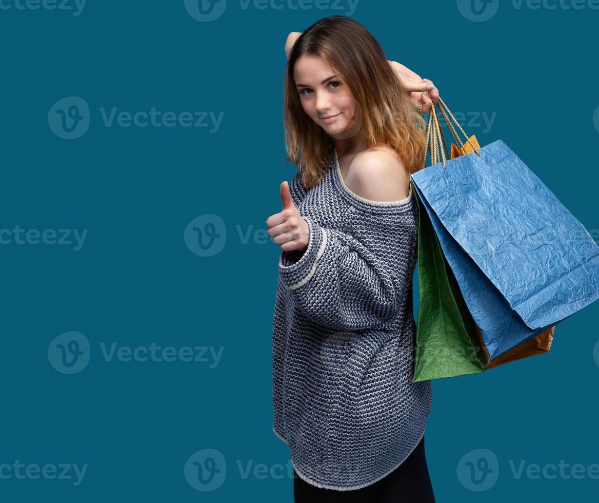 Young pretty girl with shopping bags photo