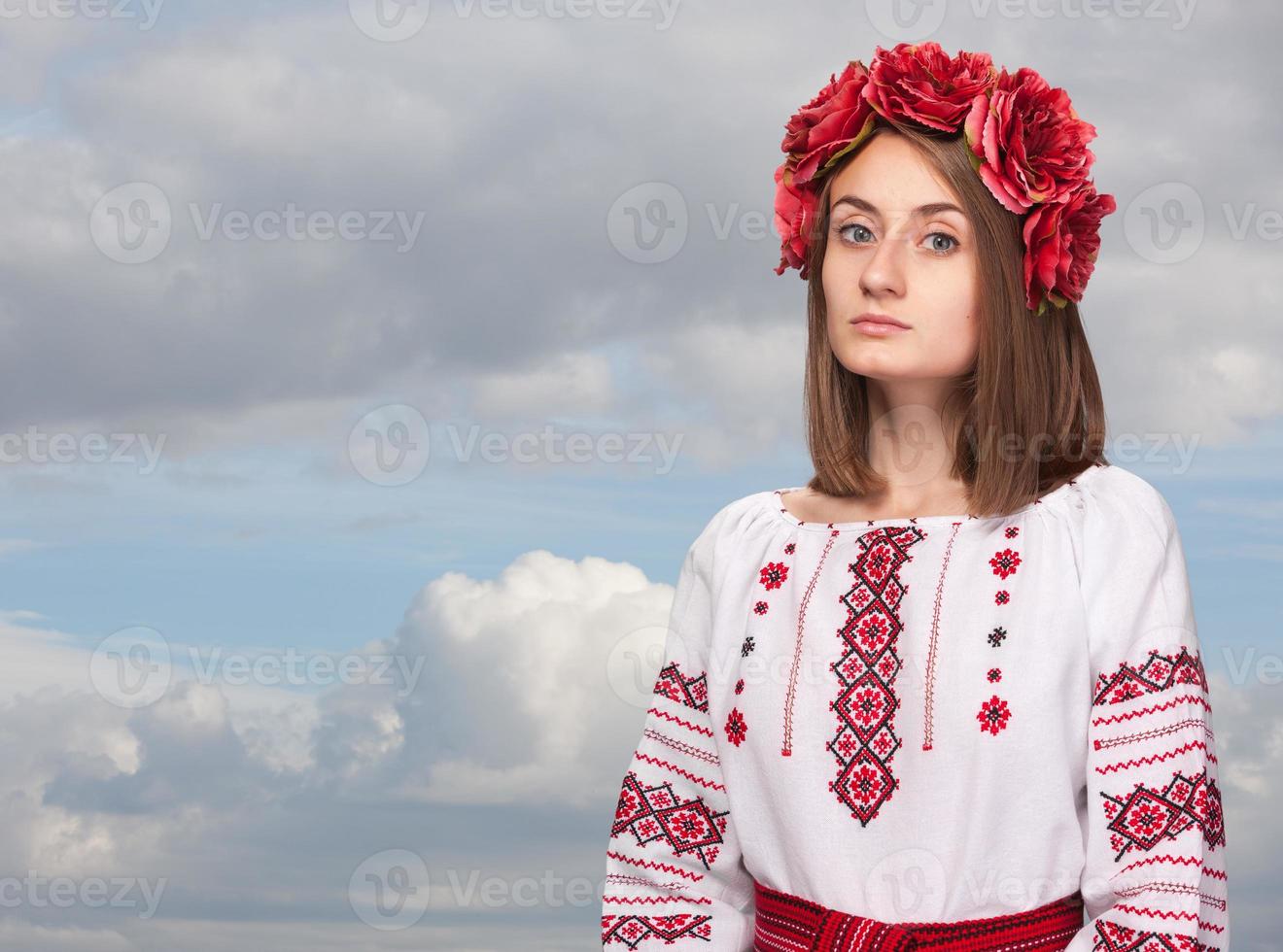 sad girl in the Ukrainian national suit photo