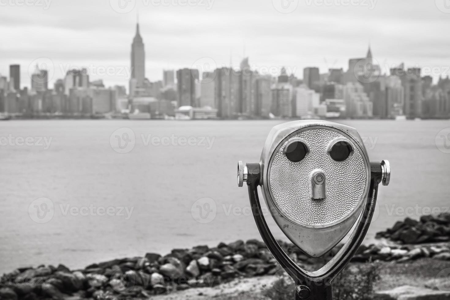 Binoculars and New York City Manhattan skyline photo