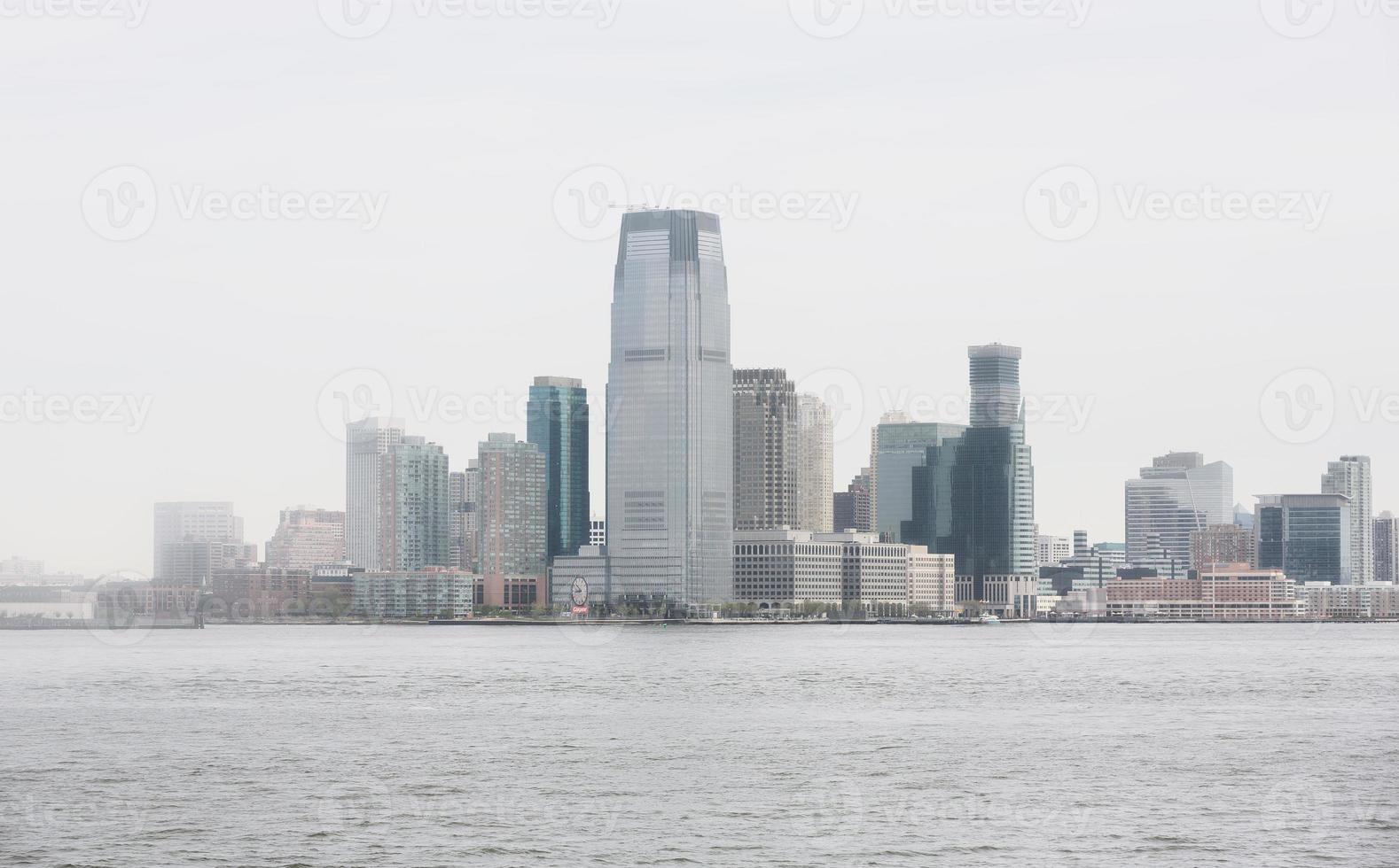 Jersey City and river Hudson on a foggy day photo