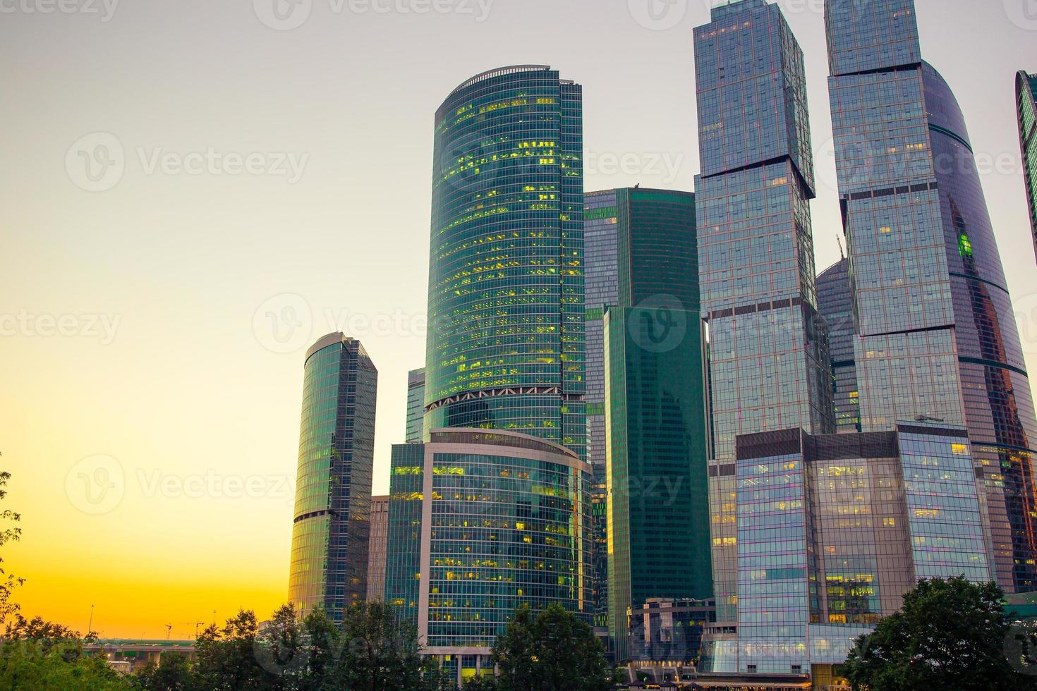 Big modern skyscrapers buildings in evening lights photo