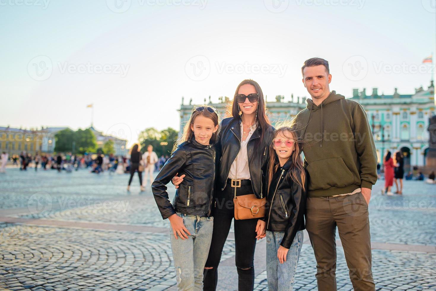 Family of parents and little girls visiting the Hermitage, Saint-Petersburg. photo