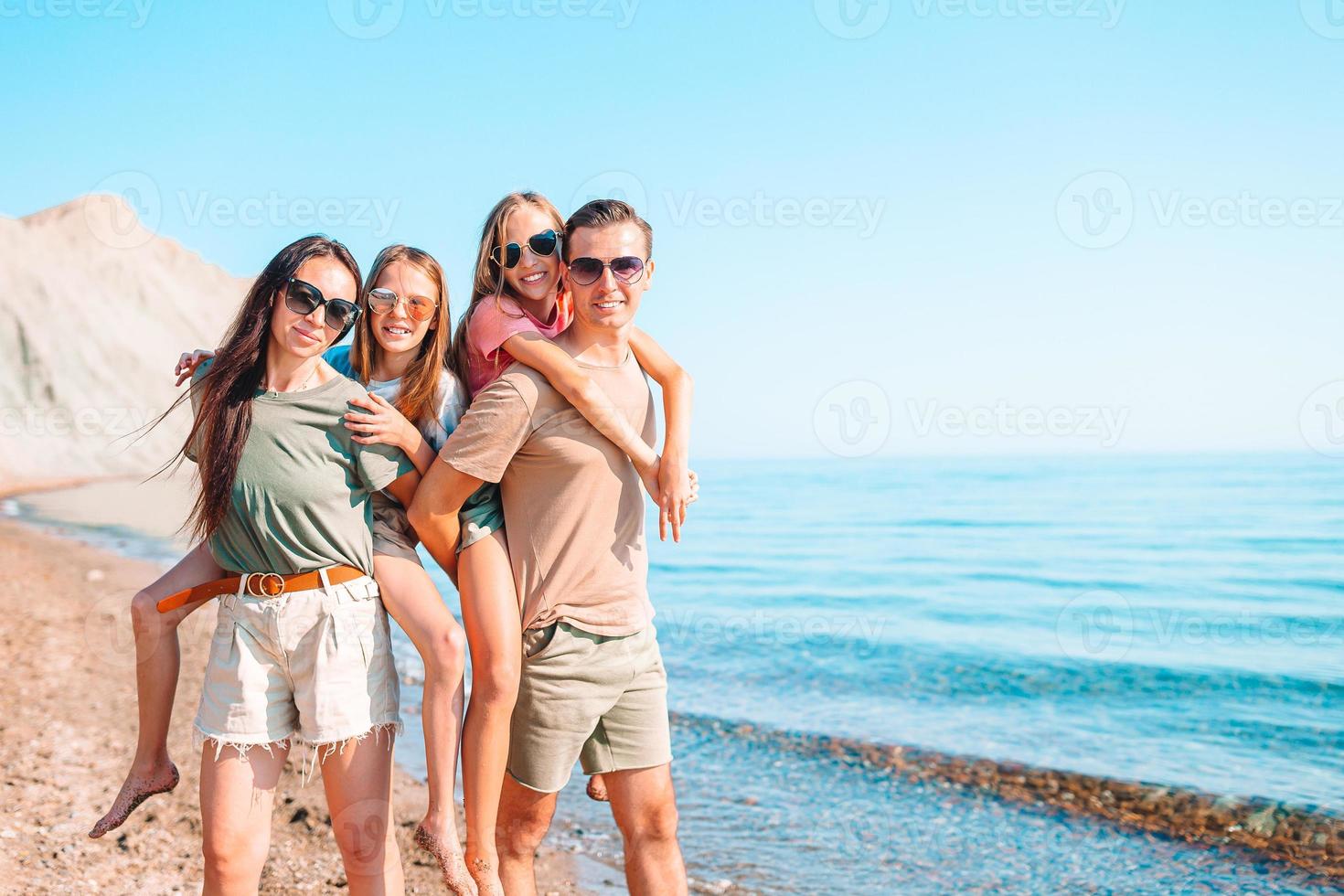 Young family on vacation have a lot of fun photo