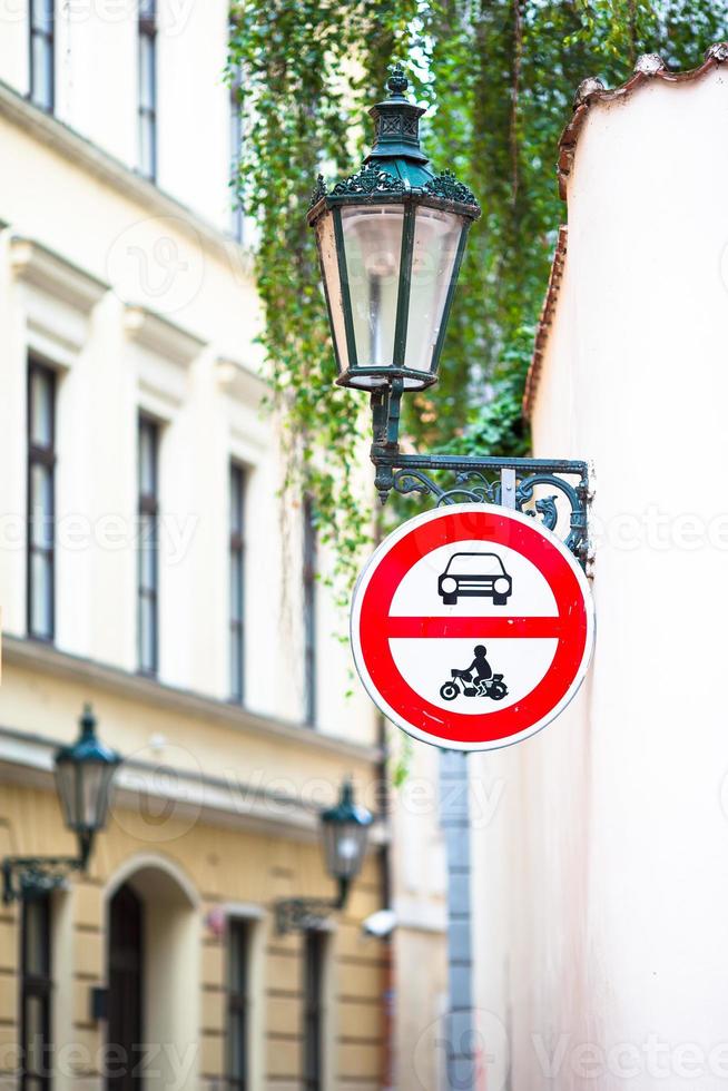 Old narrow street in Europe. District of the city of Prague, Czech Republic, and one of its most historic regions. photo