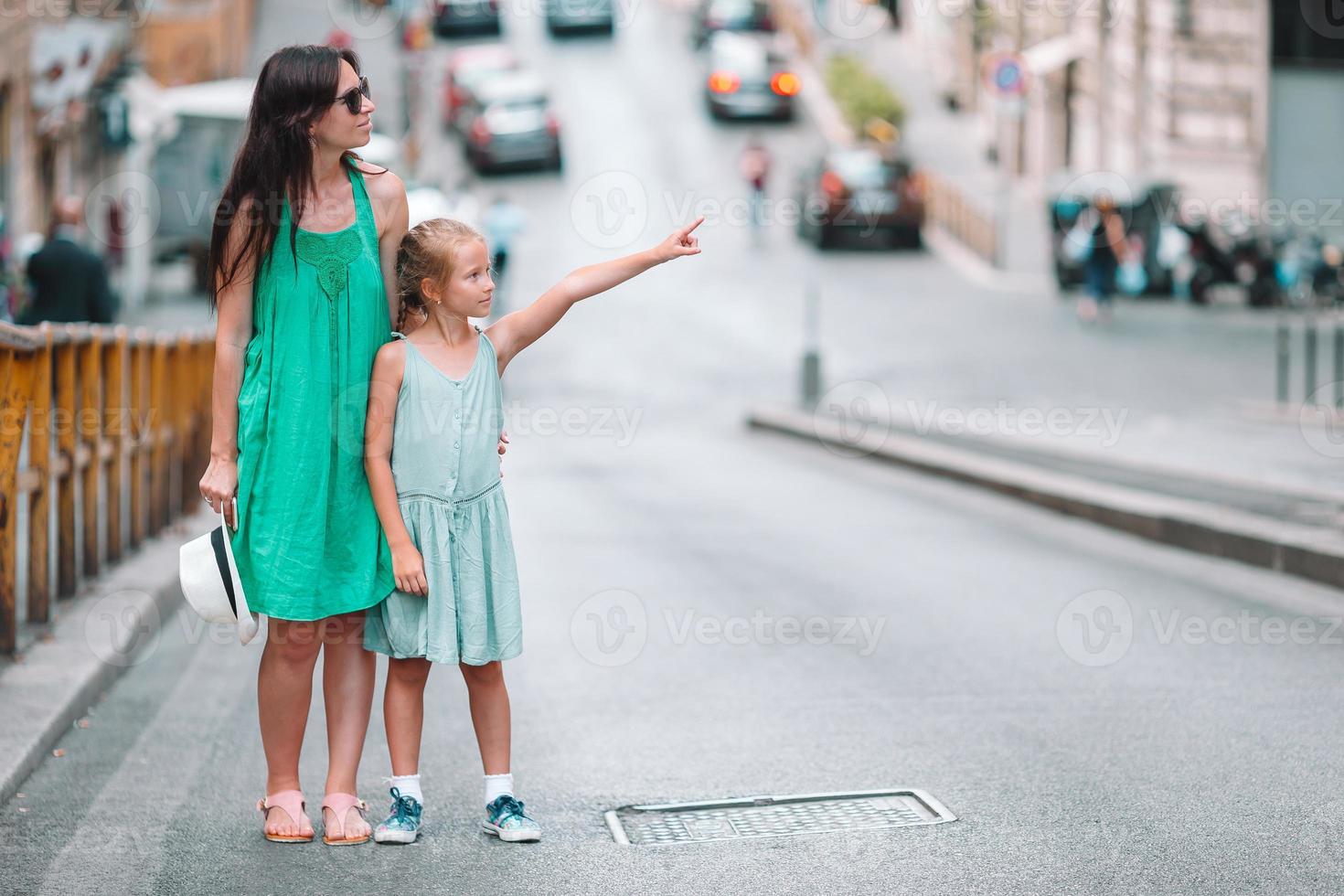 Happy mom and little adorable girl traveling in Rome, Italy photo