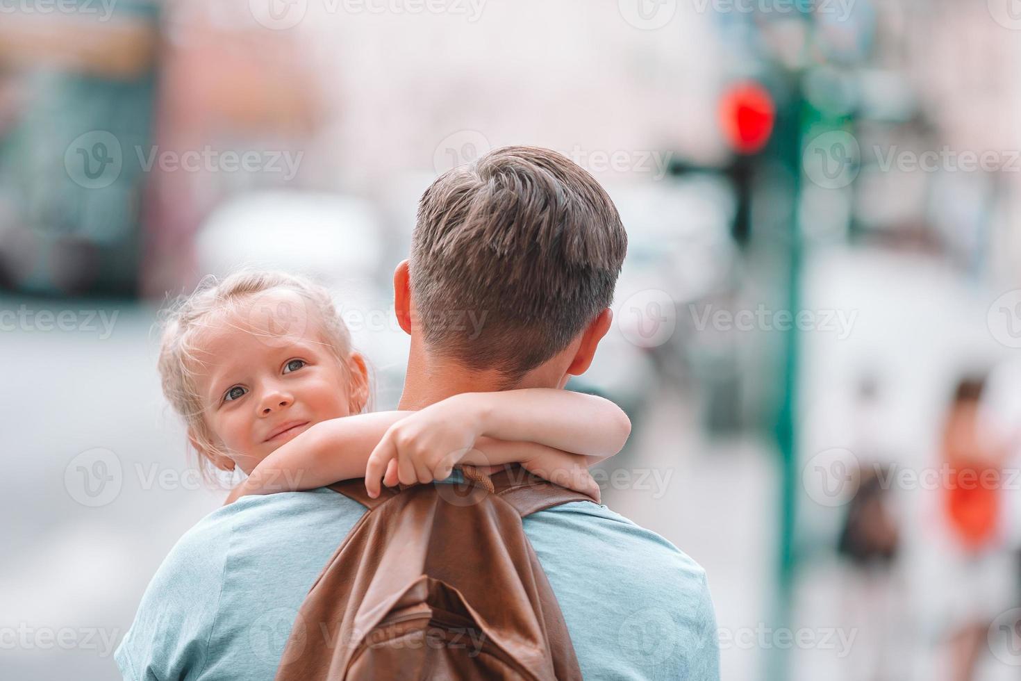 Happy dad and little adorable girl traveling in Rome, Italy photo