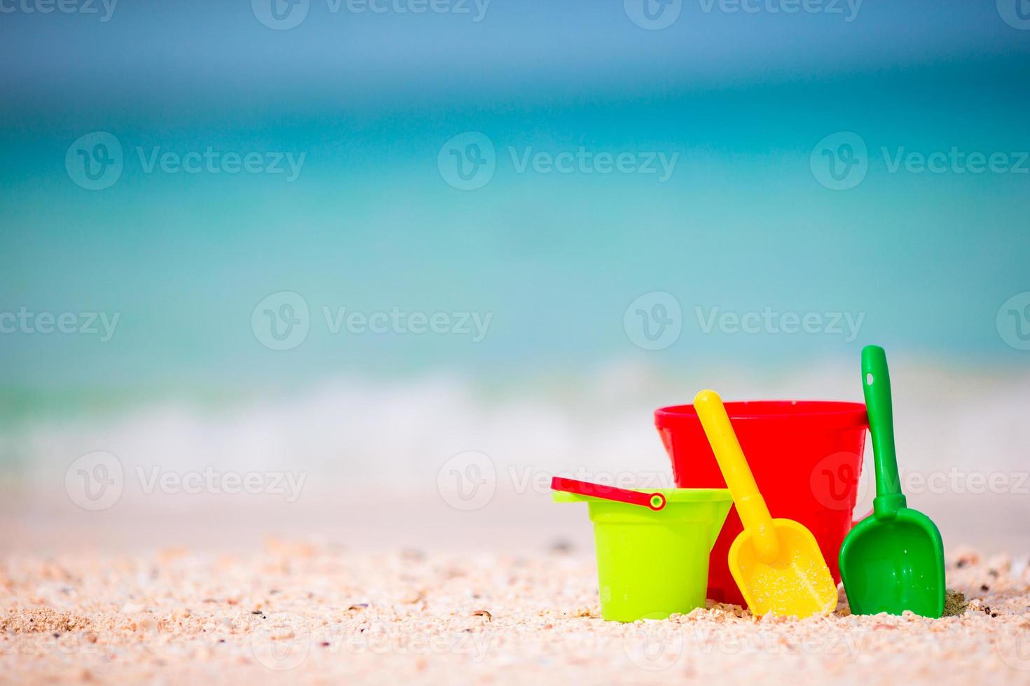 Children's beach toys background the sea photo