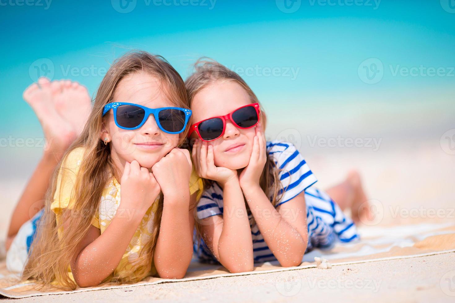 Adorable little girls during summer vacation photo