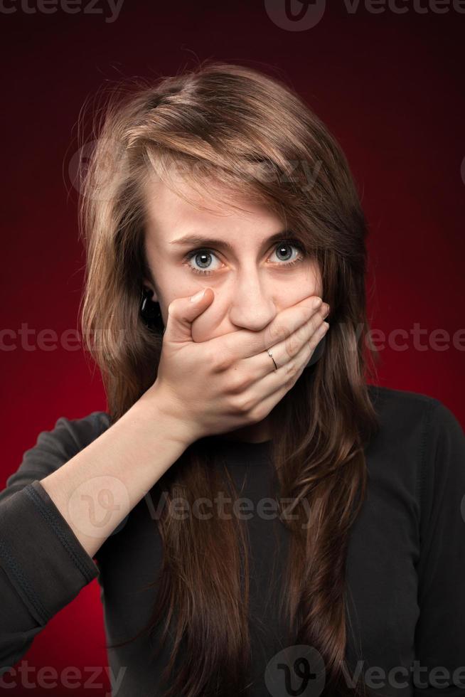 Portrait of a young emotional woman photo