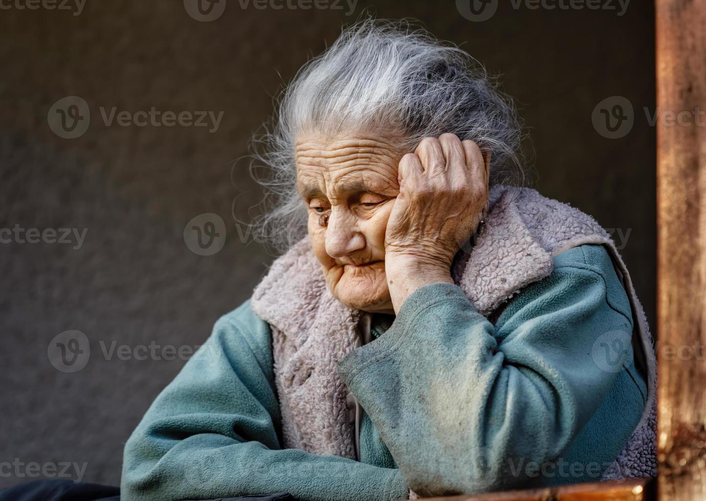 Portrait of a very old wrinkled woman photo