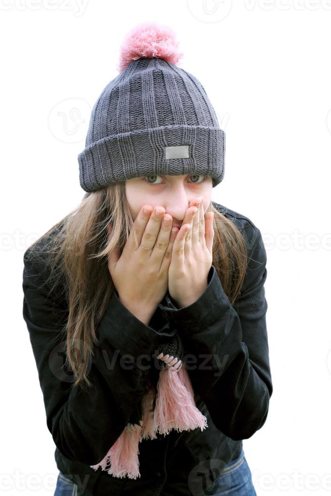 Girl trying to keep warm photo