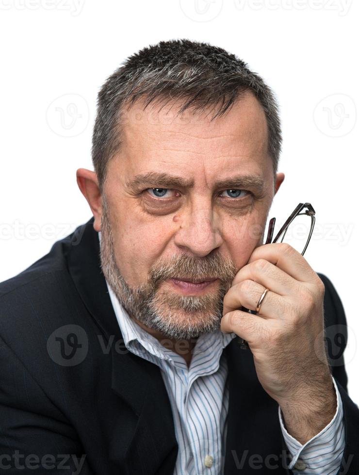 Portrait of senior businessman in a black jacket photo