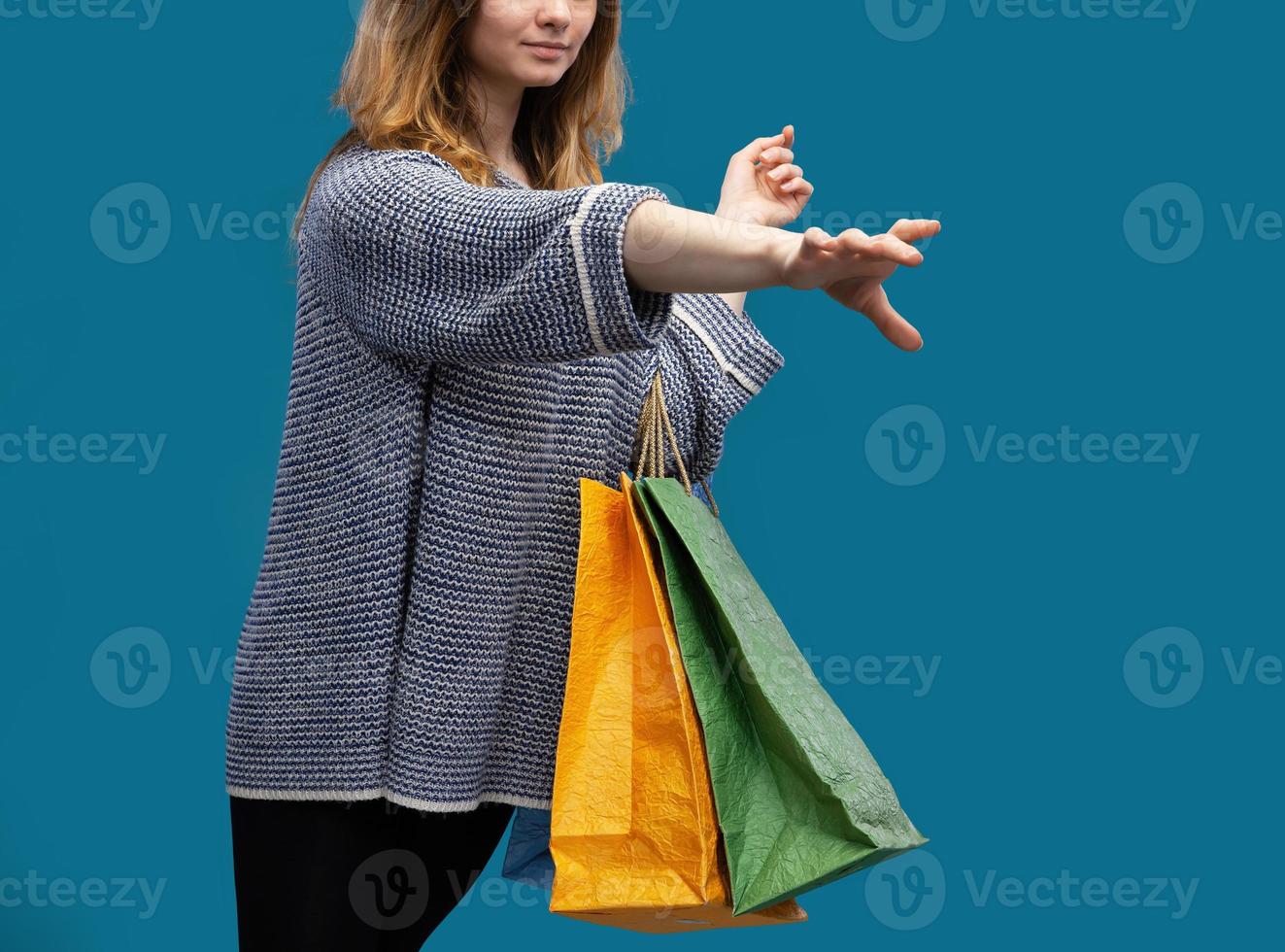 Young pretty girl with shopping bags photo