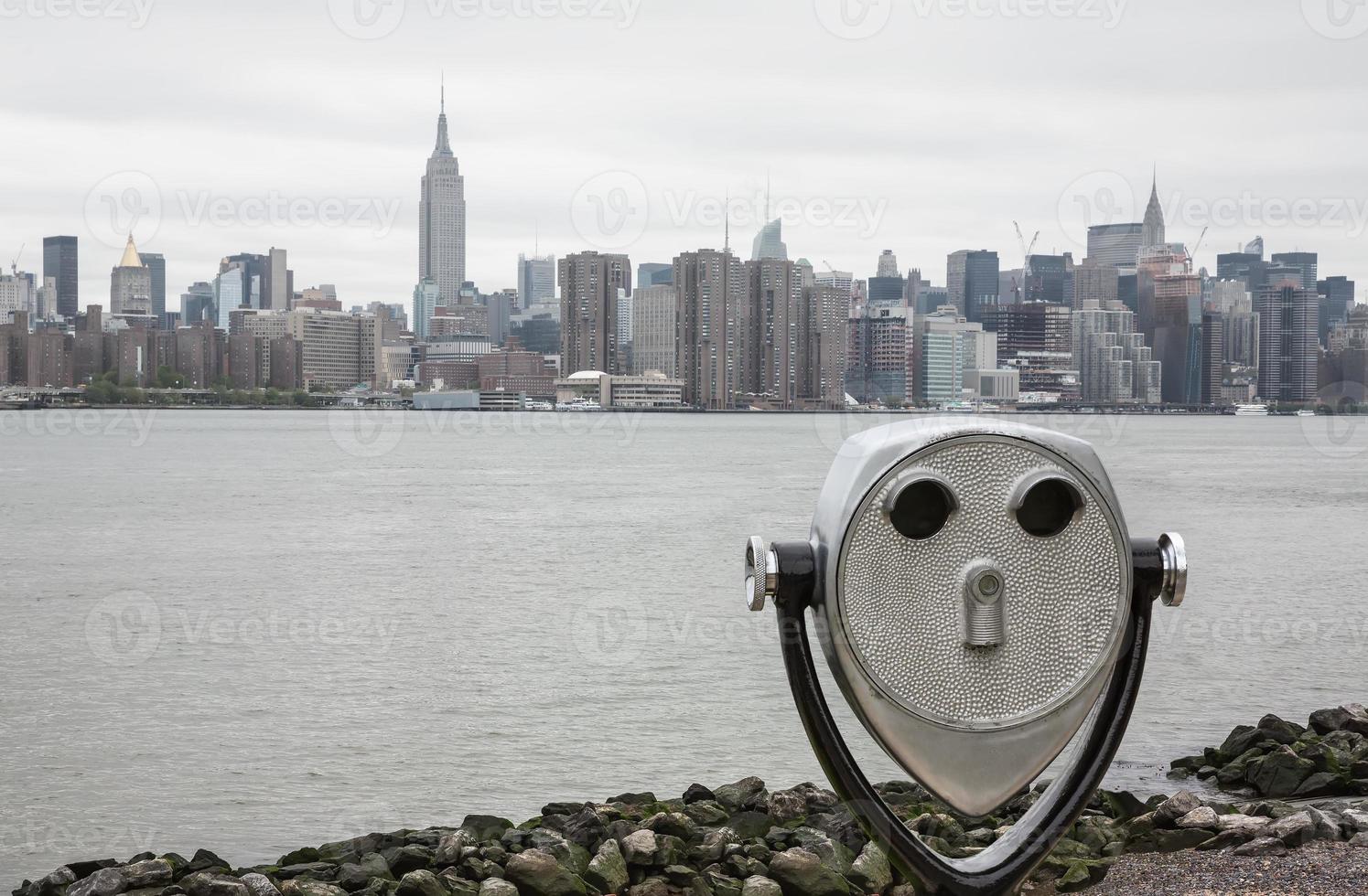 Binoculars and New York City Manhattan skyline photo