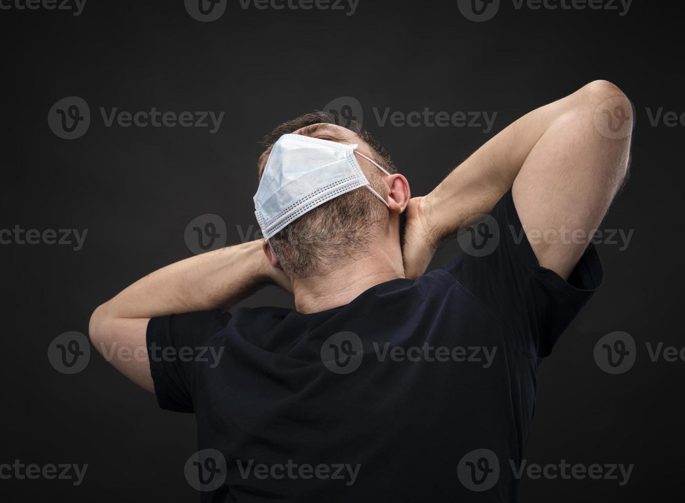 sick old man in medical mask photo