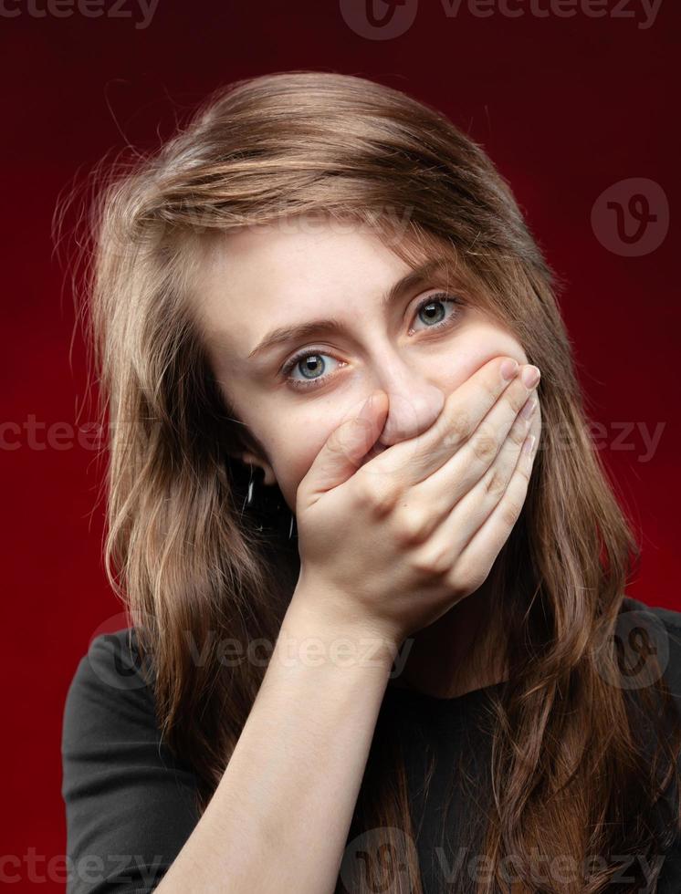 Portrait of a young emotional woman photo