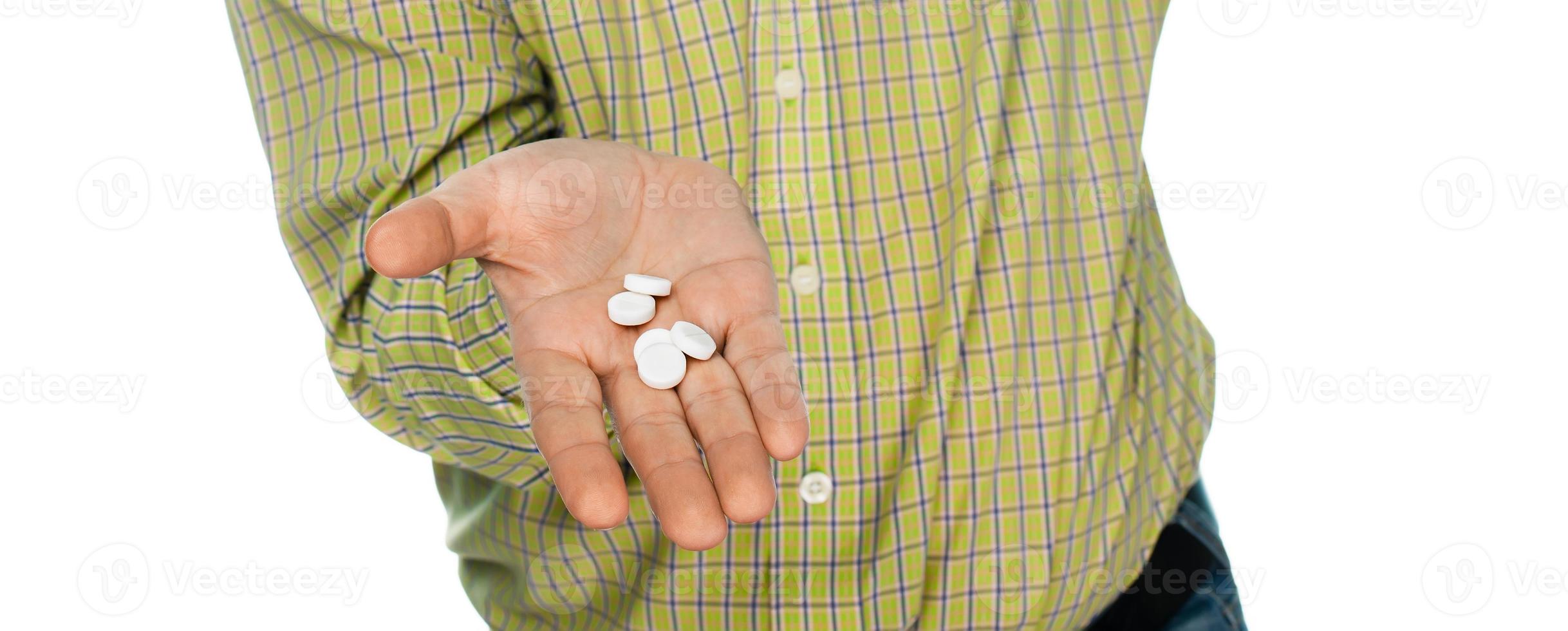 Elderly man with pills photo