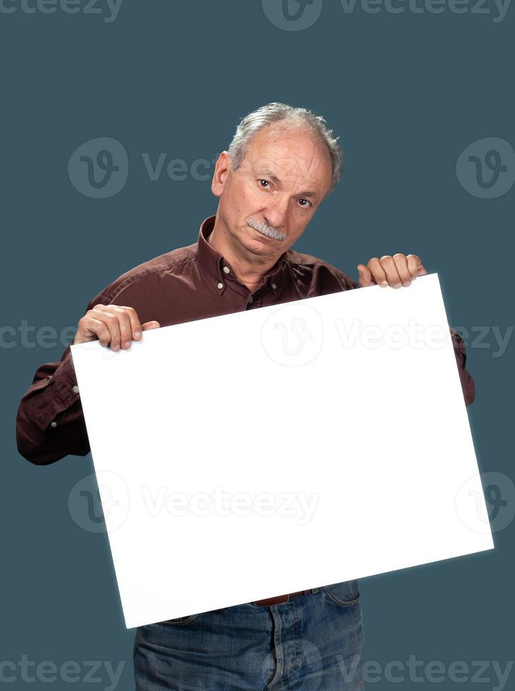 Senior man holds a blank board photo