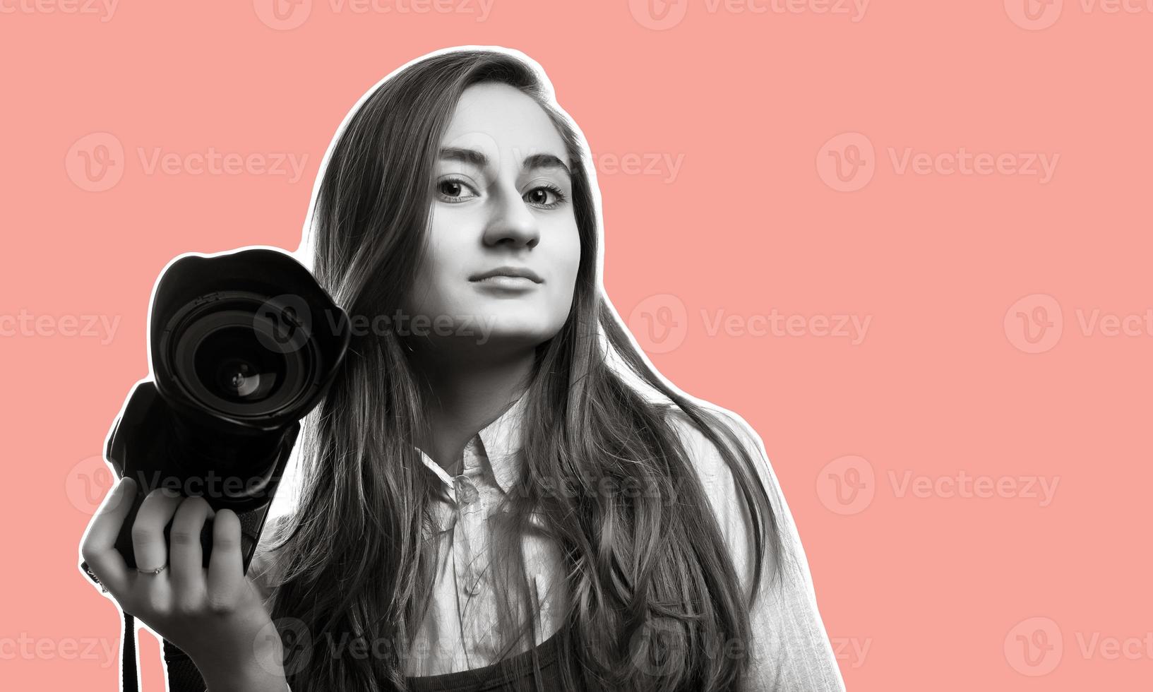 Young woman photographer photo